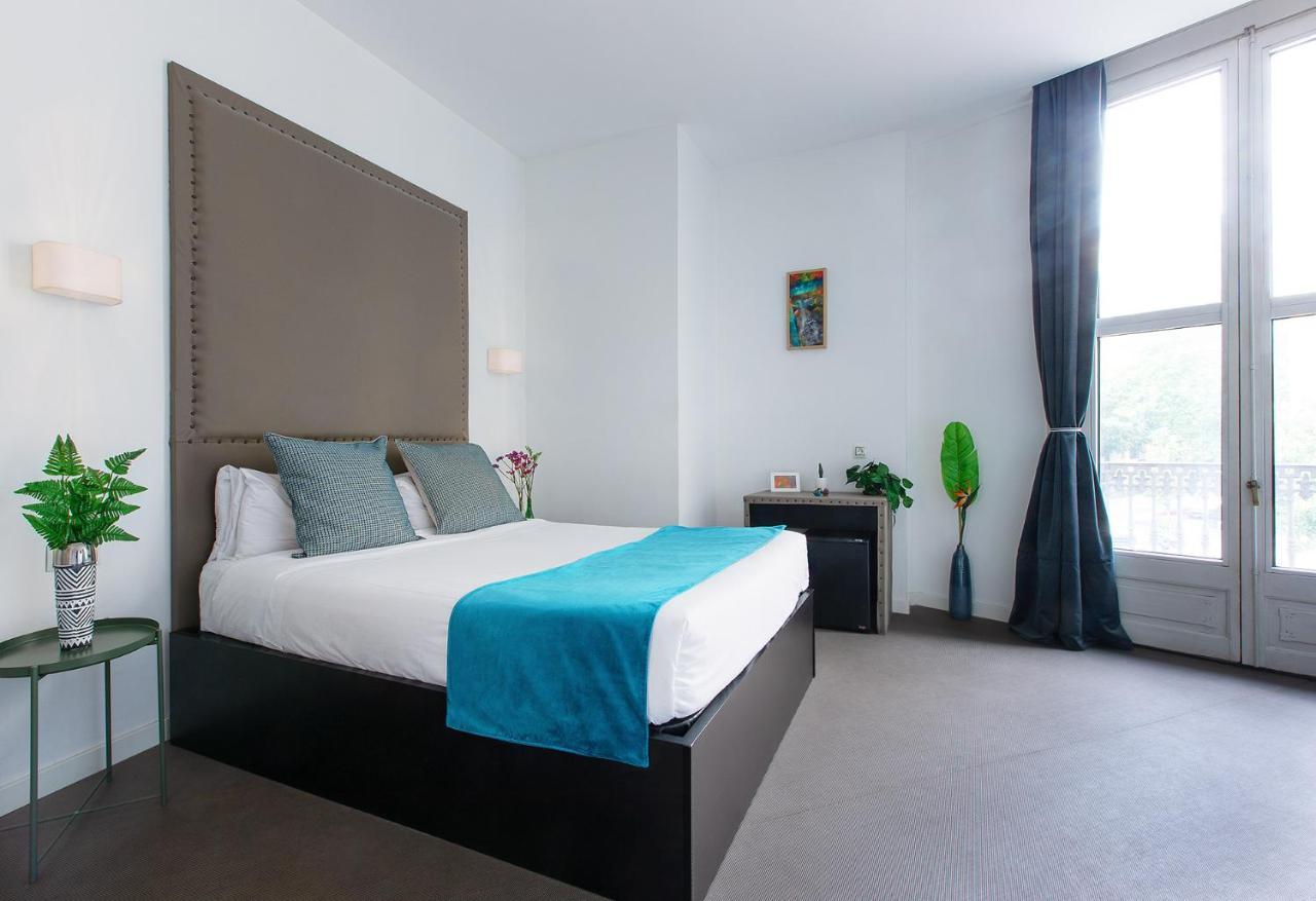 Amra Barcelona Caspe Hotel Bagian luar foto