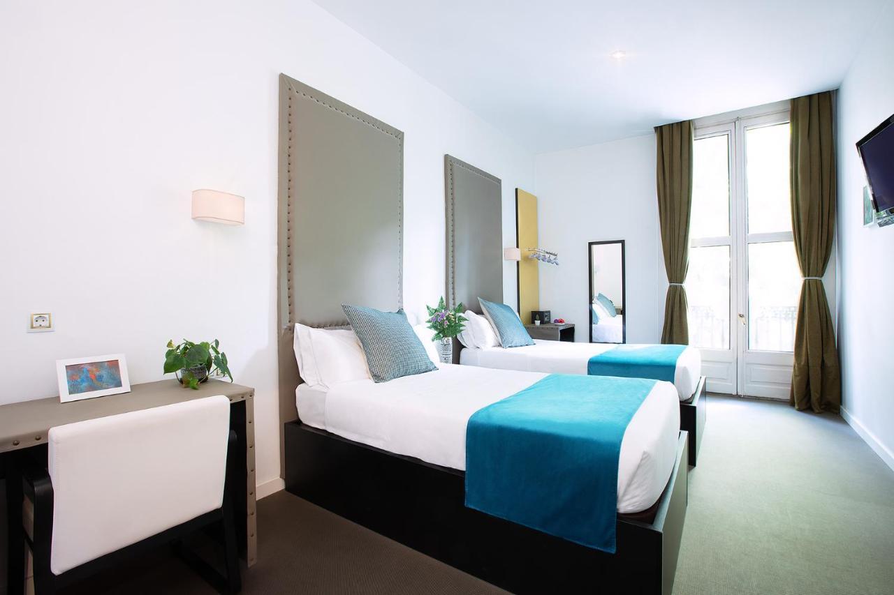 Amra Barcelona Caspe Hotel Bagian luar foto